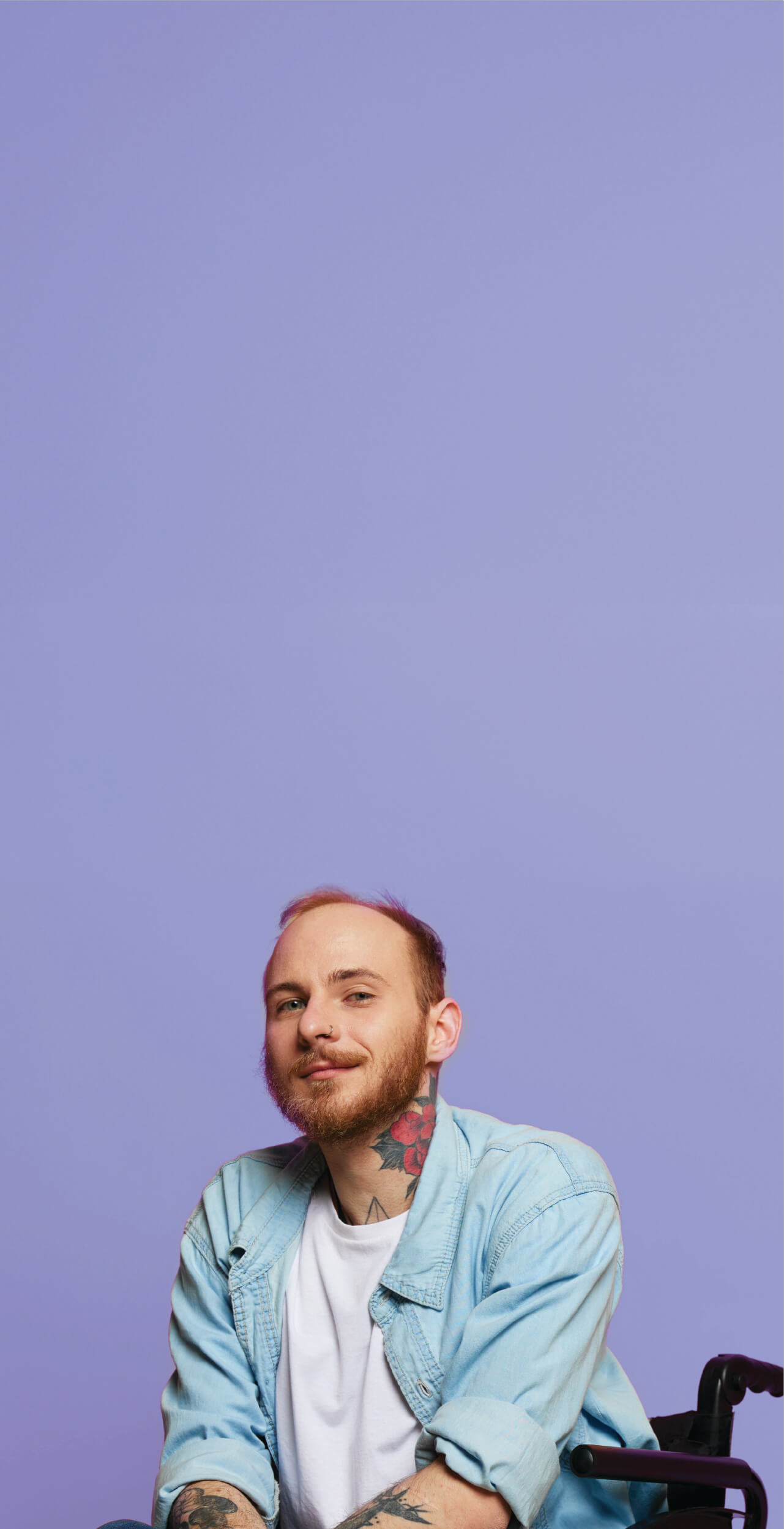 Person with a disability in a wheelchair receiving support through The People Project Tasmania’s disability services